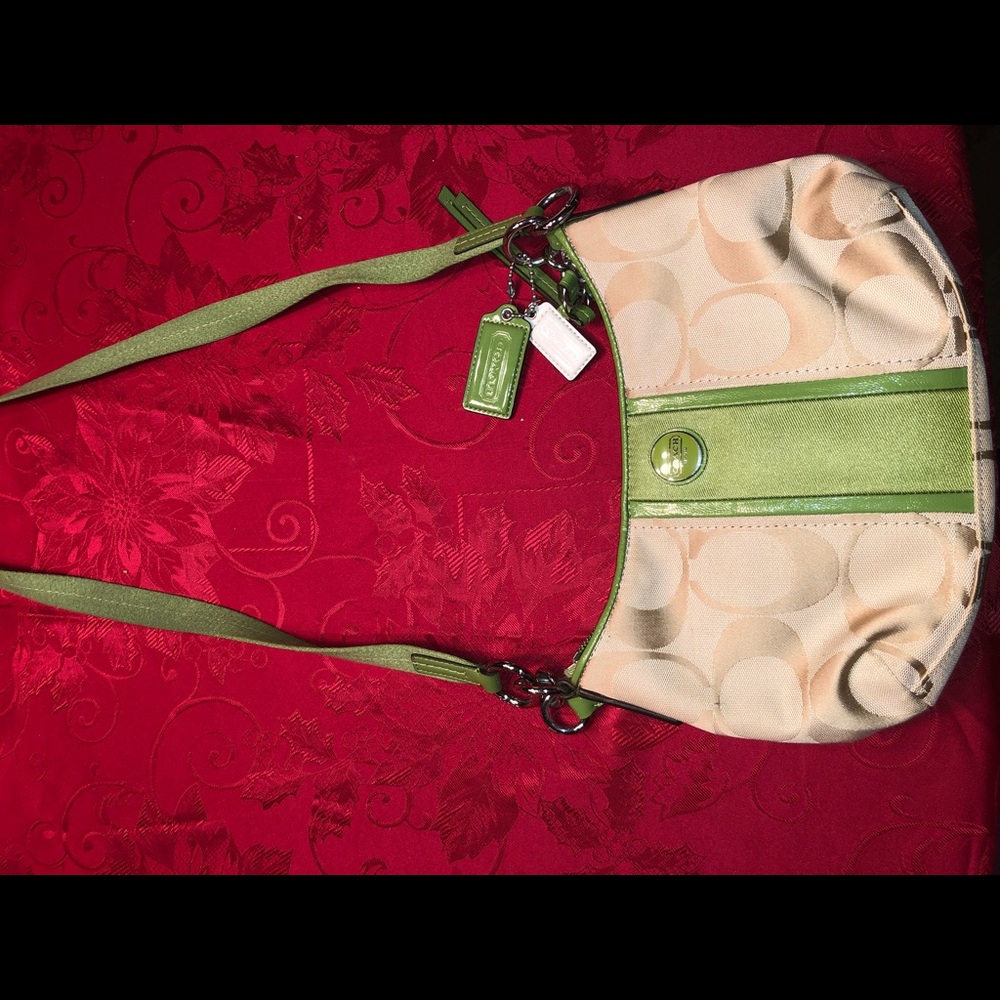 Beige and green coach purse